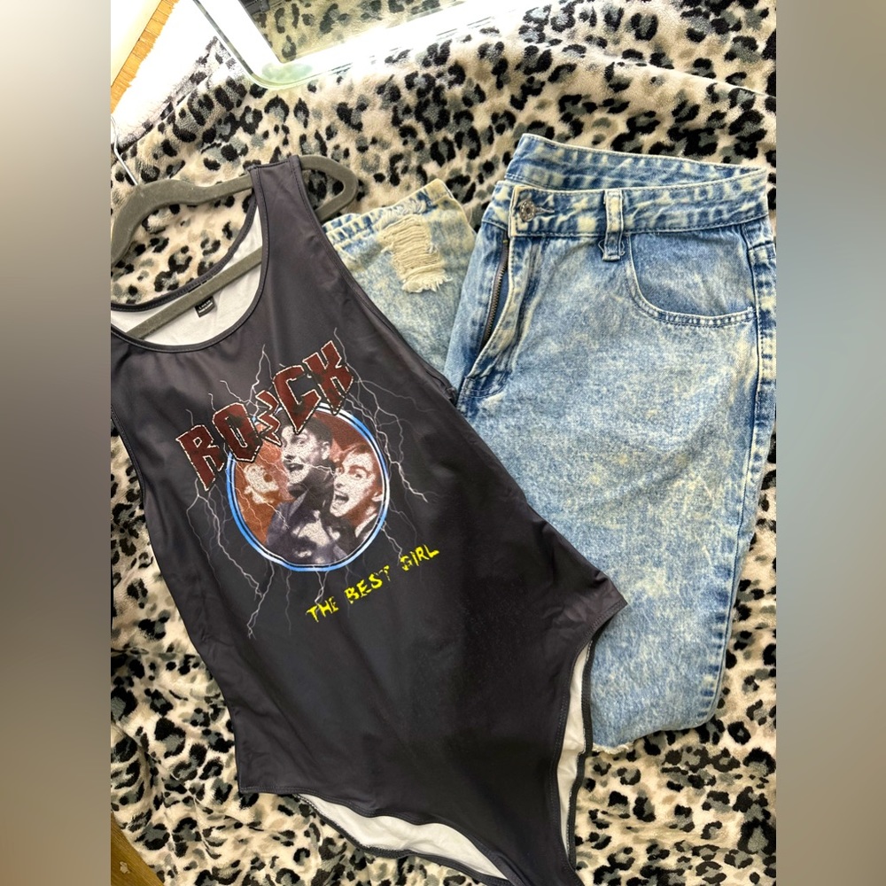 DUO! boyfriend style jeans, with graphic onies. Both size large from SHEIN .